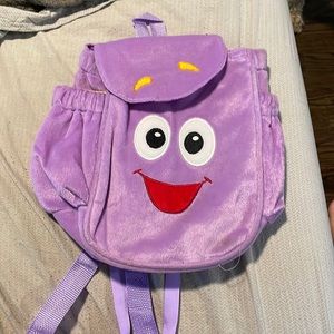 Dora the explorer costume: backpack and wig
